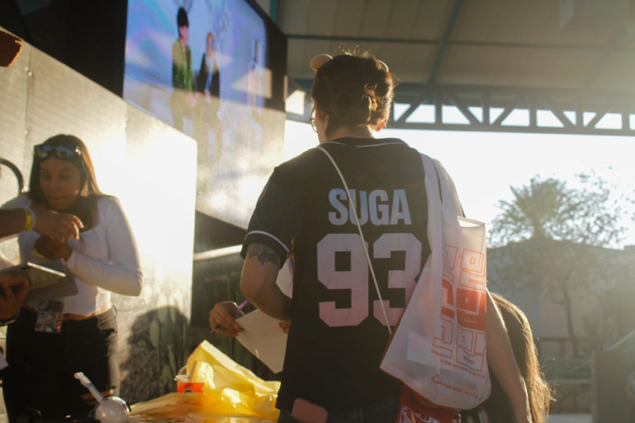 K-pop fans dressed in their favorite merch from their favorite groups that featured individual K-pop stars such as SUGA from the group BTS.